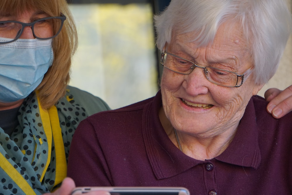 a woman with a caregiver.