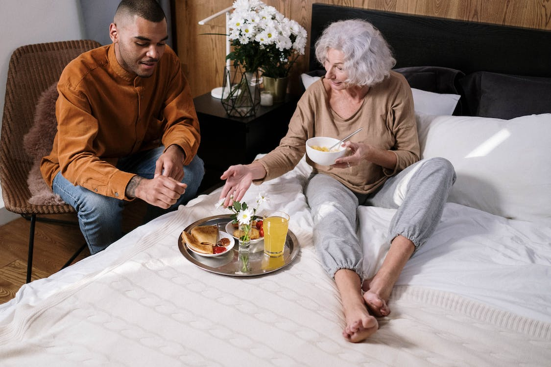 a caregiver with an older woman.