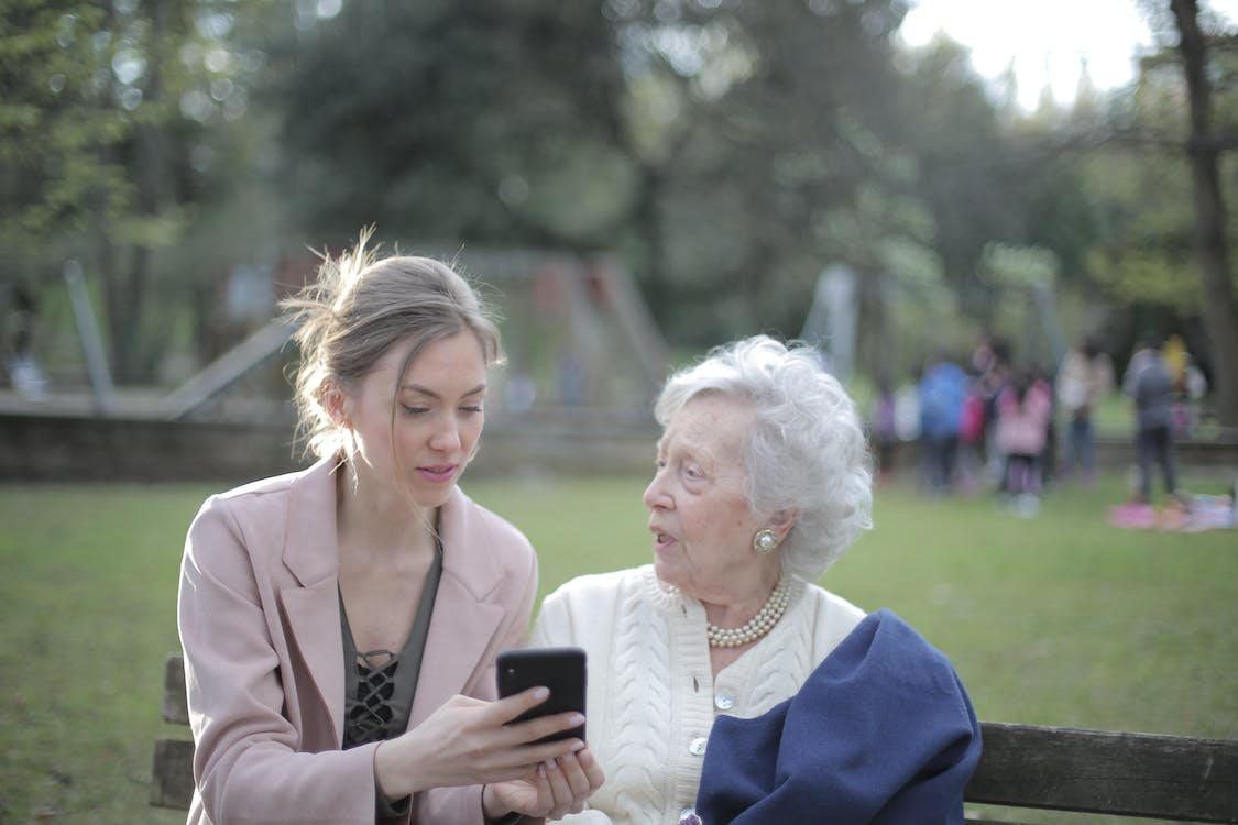 a caregiver with an elderly woman.