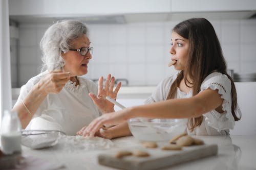  a girl with an elderly woman. 